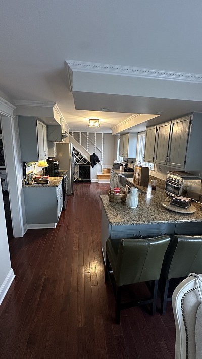 Finishing painting a family kitchen